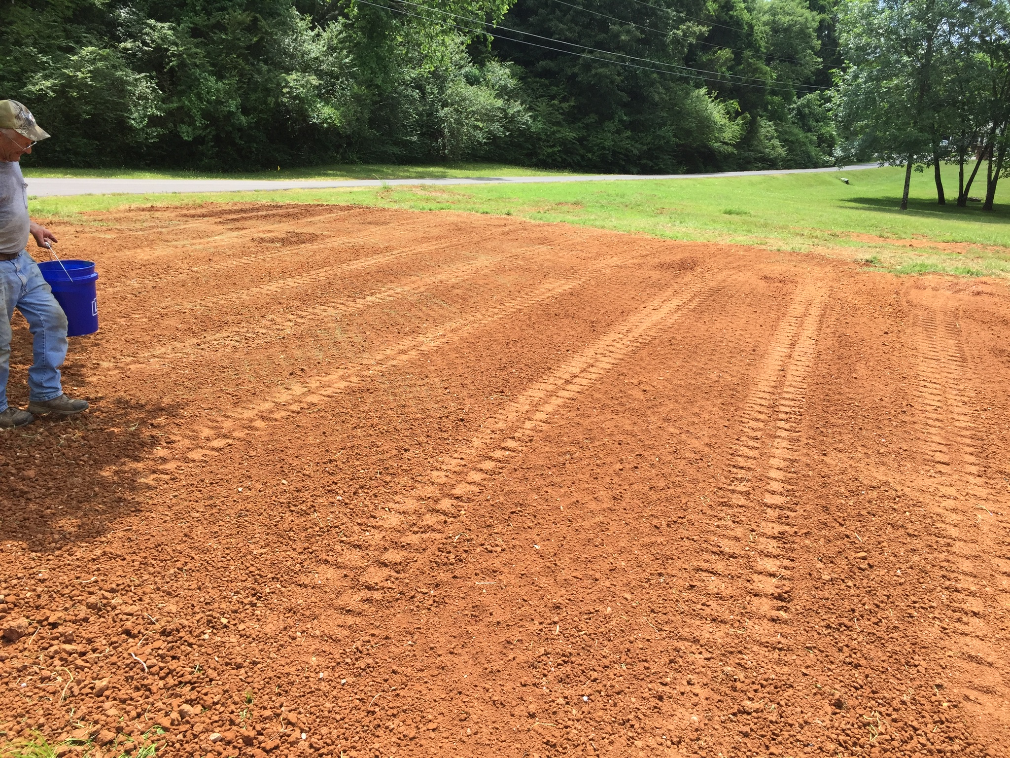 Man Working on Clearning Field